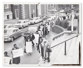 (CIVIL RIGHTS.) PHOTOGRAPHY. Group of 16 press wire service photographs from the decades of the civil rights struggle, the shooting of